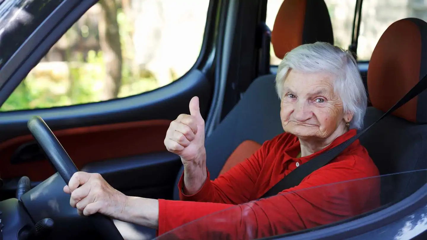 confident-eldery-driver.webp