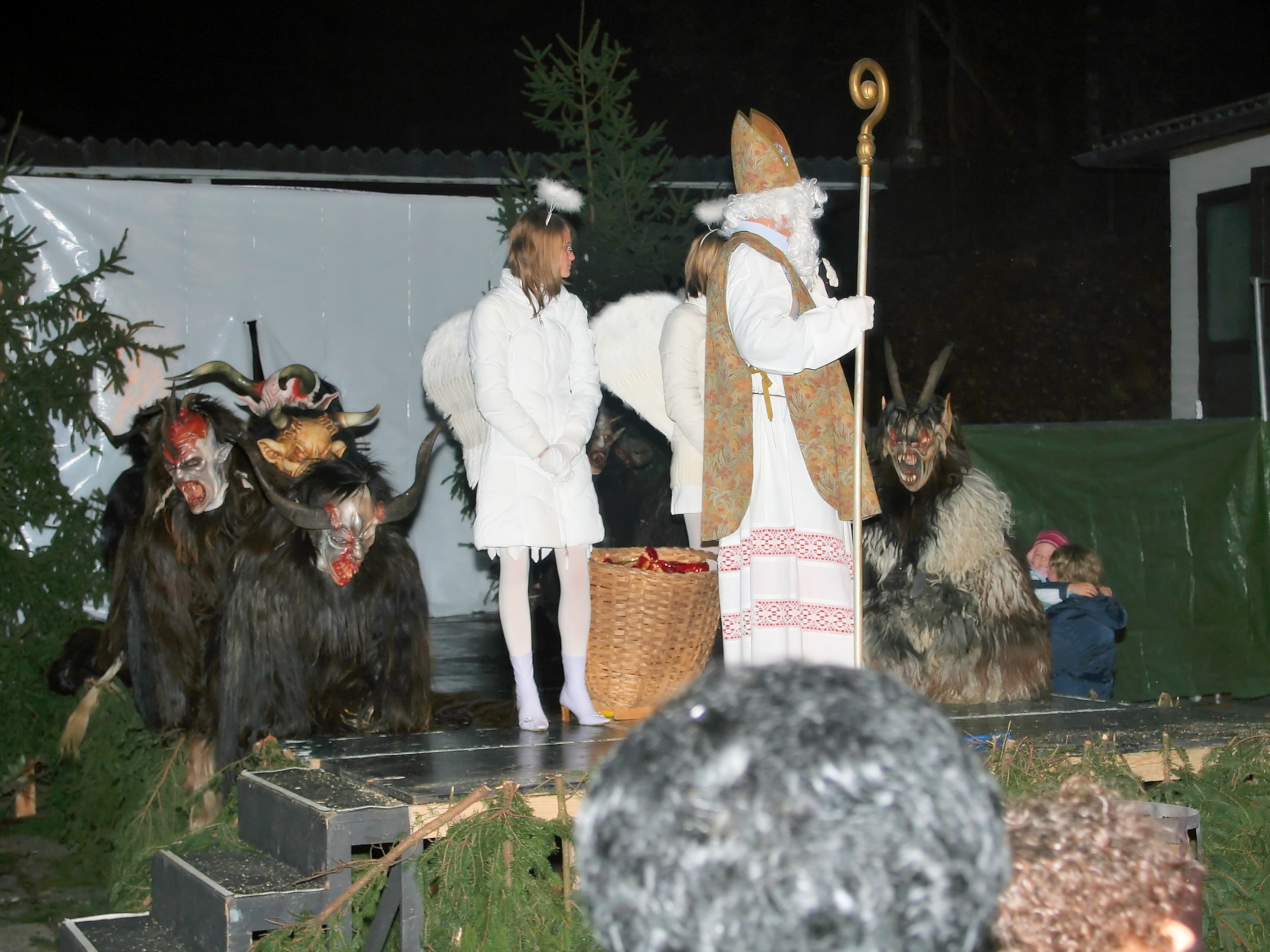 Krampus_Salzburg_with_bishop_and_angel.jpg