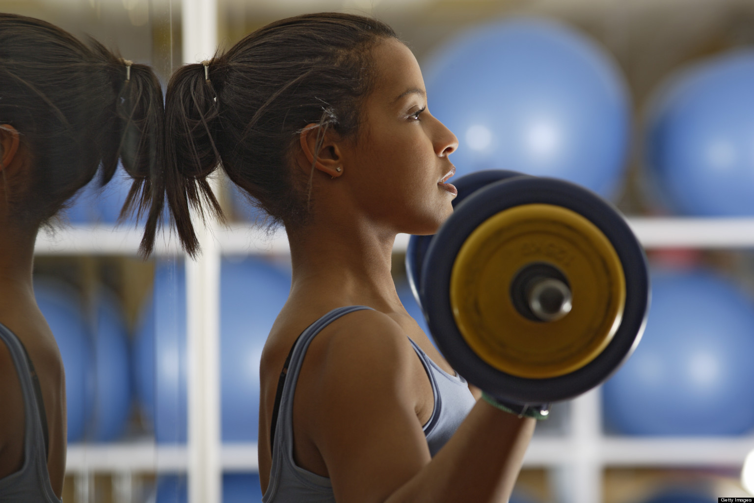 o-WOMAN-WEIGHT-LIFTING-facebook.jpg