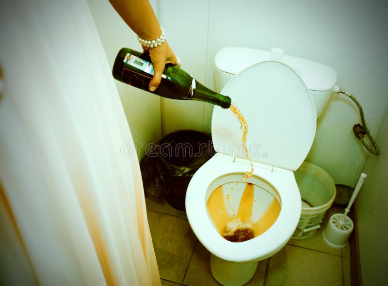 woman-pouring-champagne-toilet-16812047.jpg