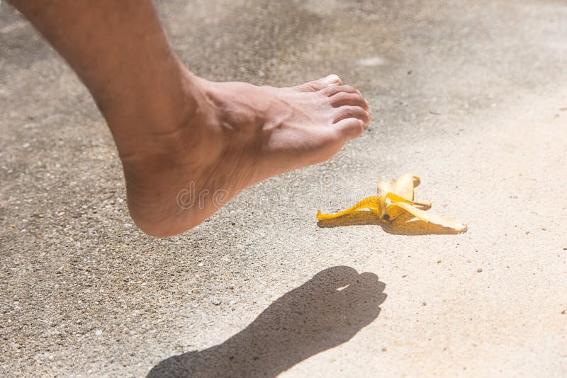 foot-slipping-banana-peel-floor-cement-48587430.jpg