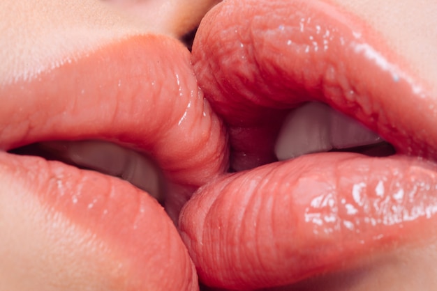 closeup-women-mouths-kissing-licking-lips_265223-84.jpg